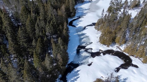 Wolf river. Frozen river in winter. Mastigouche wildlife reserve. Province of Quebec. Canada