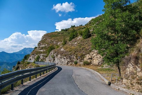 Picturesque landscape on the Strada Provinciale 17 pass road and Capelletta votiva di Drego chapel