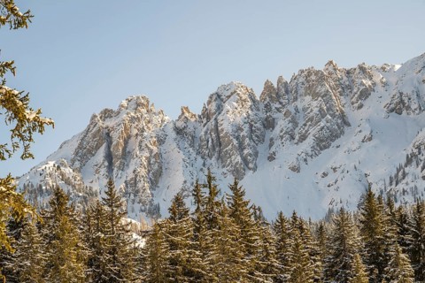 Beautiful landscape of the Mountain silhouettes of the Sexten Dolomites on a sunny winter day,