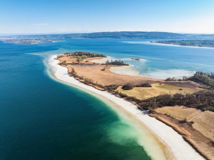 Aerial view of the Mettnau peninsula near Radolfzell on Lake Constance at low tide, the island of