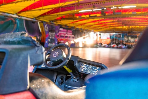 Interior of a bumper car at a fair, illuminated by colourful lights, Fasnet, Weil der Stadt,