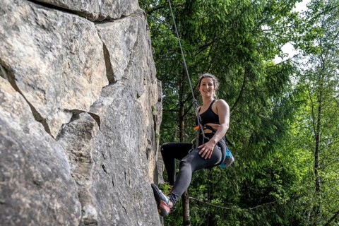 Climber rock climbing, woman climbing in toprope, sport climbing, climbing garden Bad Heilbrunn,