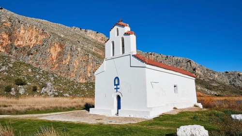 Agiou Petrou Chapel, Chapel of St Peter, A solitary whitewashed chapel stands against a mountainous
