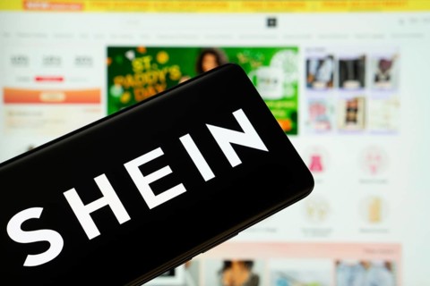 Dhaka, Bangladesh - 18 March 2025: The logo of the shein is displayed on a smartphone screen, and