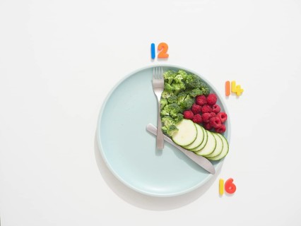 Intermittent fasting concept with hours twelve, fourteen, and sixteen using healthy food
