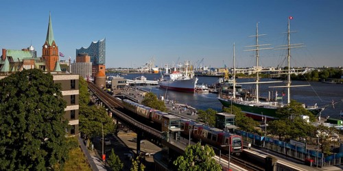 View of Hamburg harbour with museum ship Cap San Diego, elevated railway along the Elbe promenade