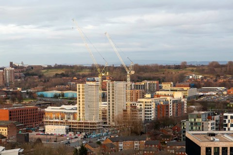 Large cranes RWInvest construction site Legacie 'The Gateway' housing development, Vauxhall,