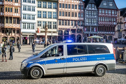 Police vehicle with flashing blue lights, Römerberg, Frankfurt am Main, Hesse, Germany