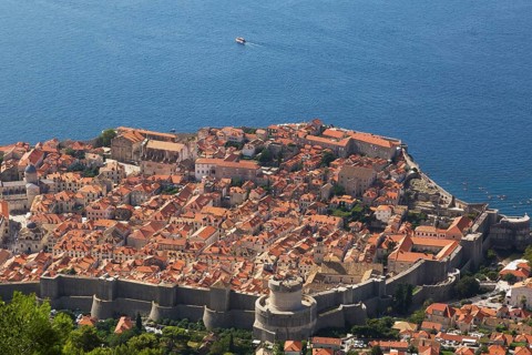 High angle view of old walled city of Dubrovnik with traditional terracotta clay tile rooftop