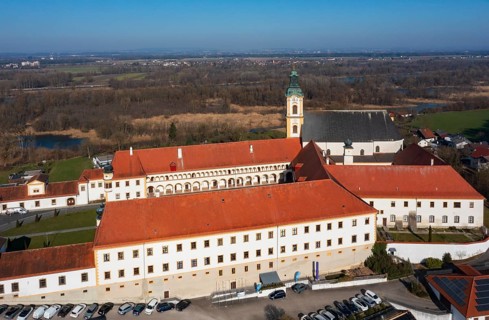 Drone shot, view of the village with Augustinian monastery Reichersberg, Reichersberg, Innviertel.