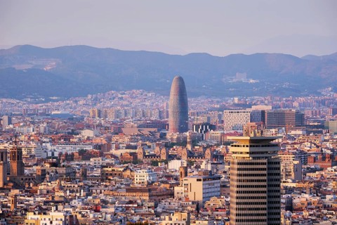 BARCELONA, SPAIN, APRIL 15, 2019: View of Barcelona city cityscape skyline on sunset. Barcelona,