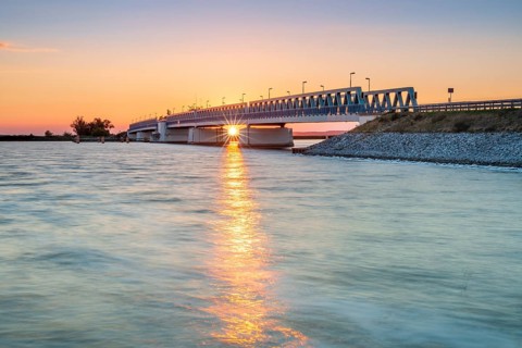 Sunset on the Peene River, bascule bridge to the island of Usedom, Mecklenburg-Western Pomerania,