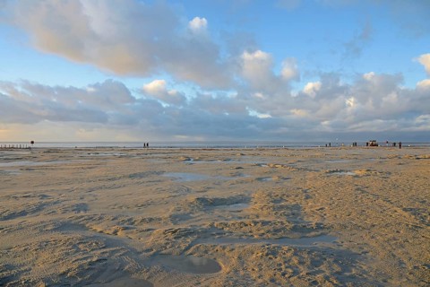 View of the beach promenade of Norddeich, Wadden Sea at low tide, North Sea, Lower Saxony, Germany