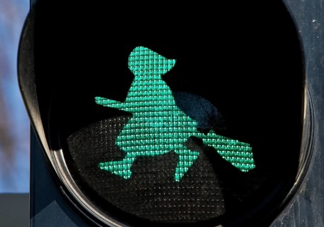 Pedestrian traffic light with green witch figure, witch traffic light, Harz witch, Harz witch