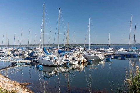 Small boats at the harbour on Lake Geierswalde, Geierswalde in the Lusatian Lakeland, Saxony,