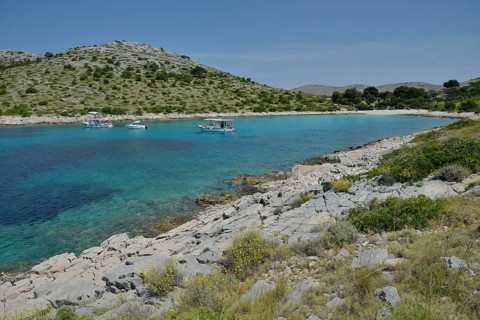 Excursion boats in Lojena Bay, Levrnaka Island, Kornati islands, Kornati National Park, Adriatic,