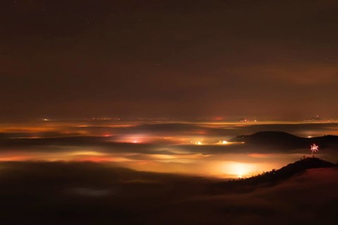 New Year's Eve fireworks 2024 on the Breitenstein, Swabian Alb near Ochsenwang. Sea of fog in the