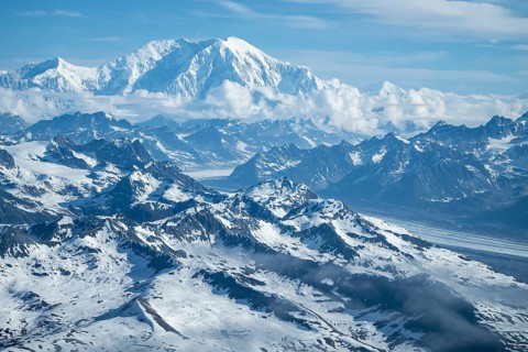 Panorama, clouds over high mountains, Mt Denali or Mount McKinley with Kahlitna Glacier, aerial