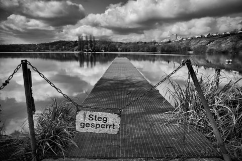 Footbridge sign blocked, chain, jetty leads in Max-Eyth-See, Hofen, behind Freiberg near Stuttgart,