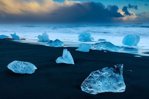 Ice chunks on the black beach, lava beach, glacier ice, sea, winter, sunset, Diamond Beach