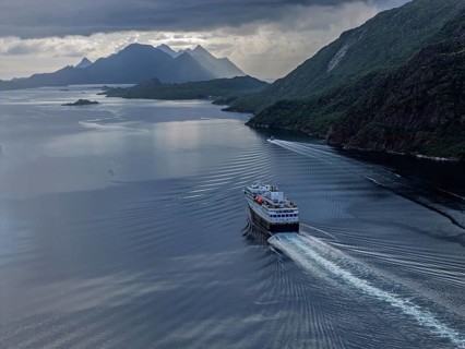 Havila voyages, alternative provider on the Hurtigruten route, cruise ship passing the Raftsund,