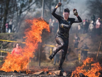 WROCLAW, POLAND - APRIL 7, 2018: Extreme running with obstacle RUNMAGEDDON. In the picture a runner