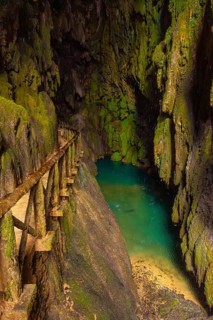 Interior of the Iris Grotto at the Cola de Caballo Waterfall in the Monasterio de Piedra Natural