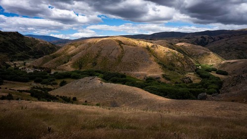 Landscape in New Zealand. View from Lindis Pass Tarras Road towards Cluden Creek Road. Lindis