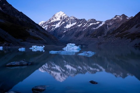Mountainous landscape. Hooker Lake and Aoraki Mount Cook. mirroring. evening mood. Aoraki Mount