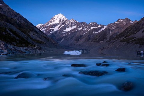 Mountainous landscape. Hooker Lake, Hooker River, and Aoraki Mount Cook. evening mood. Aoraki Mount