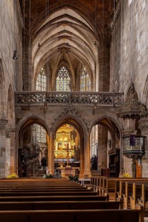 St. Dionys Town Church. interior view. Crucifixion scene on the high altar created in 1604.