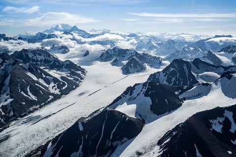 Snow and ice, epic mountains with glaciers, aerial view, Alaska Range, Denali National Park,