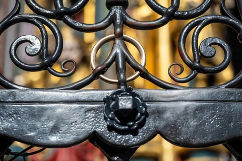 A rotating brass ring on the grid of the beautiful fountain serves as a lucky charm if you turn it