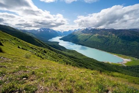 View of blue lake and mountains on Twin Peaks Trail, Eklutna Lake, Chugach Mountains, Chugach State
