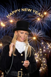 A female chimney sweep in front of New Year's Eve fireworks