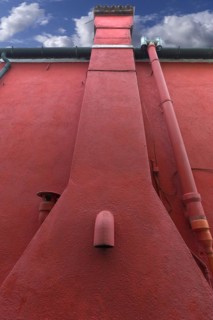 Coloured house facade with fireplace, Burano, Venice, Veneto, Italy