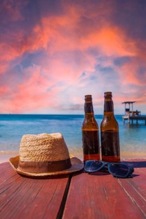 Two beers on West End beach on Roatan Island. Honduras