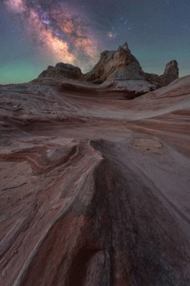 Stunning nightscape at White Pocket, Arizona, USA, capturing the Milky Way illuminating the