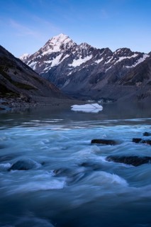 Mountainous landscape. Hooker Lake, Hooker River, and Aoraki Mount Cook. evening mood. Aoraki Mount