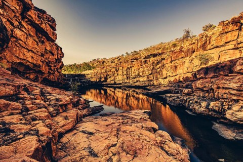 Bell Gorge waterfall, a body of water in north-west Australia in the Kimberley. Sunrise in the