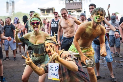 KOSTRZYN NAD ODRA, POLAND - AUGUST 2, 2018: Happy young painted people dancing and celebrating
