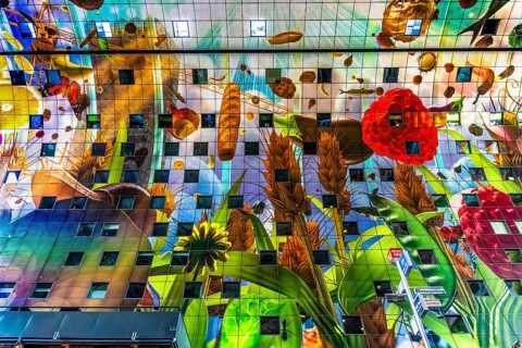 Markthal from 2014, offers over 100 food stalls and delicatessens with spectacular ceiling fresco