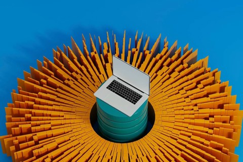 A laptop stands surrounded by vibrant data elements, symbolizing connection and network activity