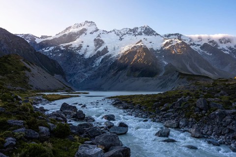 Mountain landscape with river and lake in the evening light. Hooker River, Mueller Lake, and Mount