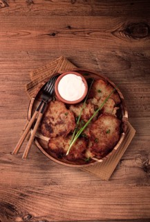 Potato pancakes, pancakes with sour cream, Belarusian dish, homemade, no people