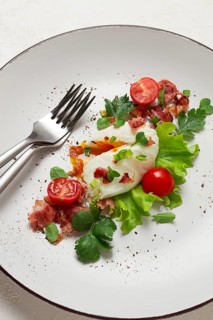 Poached egg, with bacon and vegetables, breakfast, homemade
