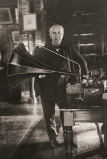 Thomas Alva Edison with his cylinder phonograph, digitally edited according to a photography by Geo