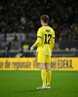 Goalkeeper Alexander Nübel GER (12) in the background perimeter advertising EDEKA Fußball DFB