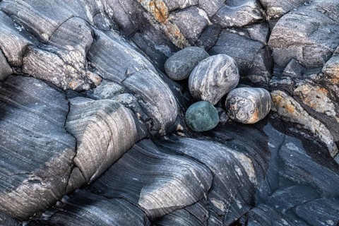 Rock structures on the coast, Söröya, Finnmark, Norway, February 2019