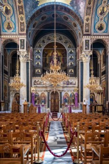 Cathedral of the Annunciation, Greek Orthodox Church, altar and rows of chairs, decorated interior,